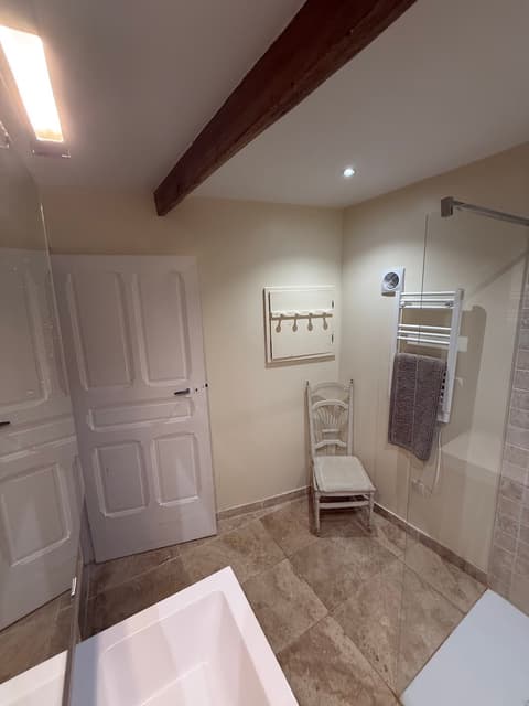 Ground floor bathroom with antique chair