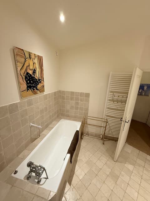 Room 1 - bathroom vanity and artwork