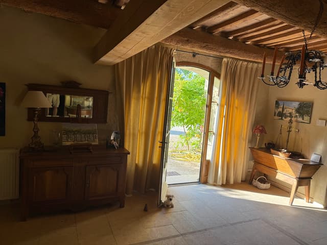 Entry with pétrin, antique scales, and Margerie painting