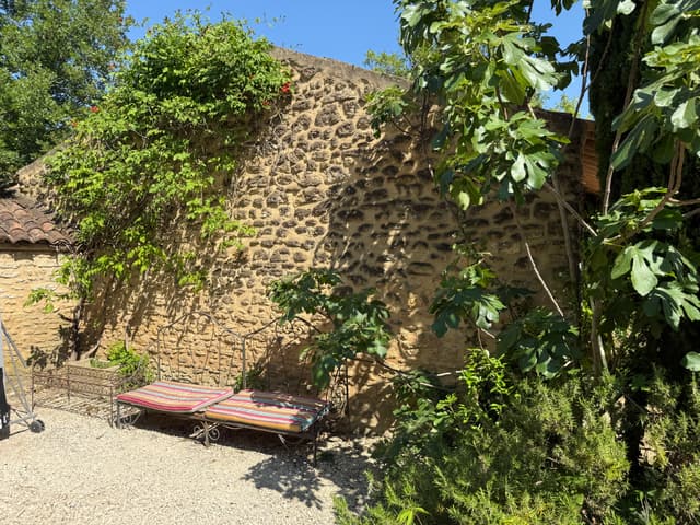 Traditional stone walls and shutters