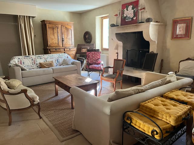 Living room with armchairs and mirror
