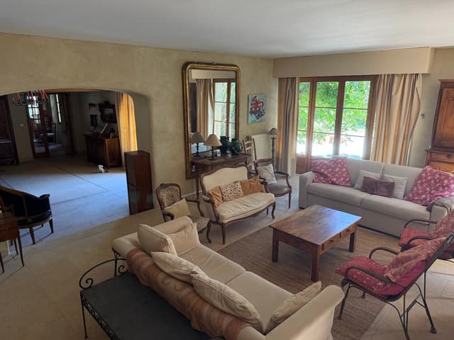 Living room with armchairs and lamps