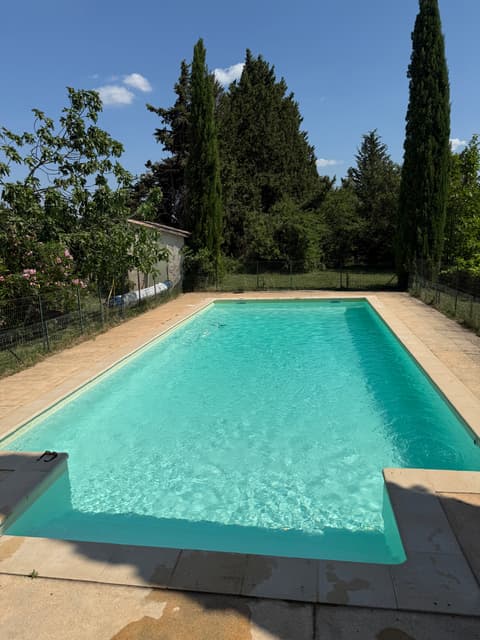 Pool area with sun loungers